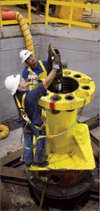 Test pipe was distorted to resemble what is reasonably expected to be at the deepwater site. During the night shift, the flanged “mule shoe” transition spool assembly was prepared for systems integration testing at Oil States Industries’ high-bay fabrication unit in Houston in June 2010. Source: BP.com