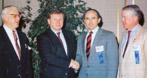 James C Day (third from left) congratulates Dr Lee Hunt (second from left) upon Dr Hunt’s election as IADC’s executive leader in 1990. At left is Dr Hunt’s predecessor Ed McGhee, and at right is 1989 IADC chairman Gary Kott.