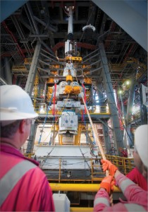 The capping stack BOP is skidded onboard the Transocean Discoverer Inspiration to mate with the Vetco and EDS control panel on top of the moon pool in July 2010. Source: BP.com