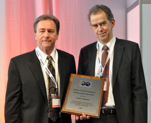 Fred Dupriest (left), who recently retired from ExxonMobil, received the 30th SPE Drilling Engineering Award from 2013 Drilling Conference chairman Øystein Arvid Håland (right) at the SPE/IADC Drilling Conference in Amsterdam on 5 March.