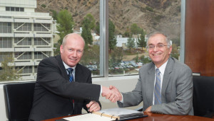 Lars Hoier (left), senior vice president, research, development and innovation at Statoil, and Dr Charles Elachi, NASA Jet Propulsion Laboratory director, seal the partnership in 2013.