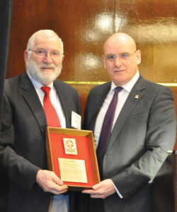 IADC President and CEO Stephen Colville (right) presents an IADC Exemplary Service award to Joe Hurt during the IADC Health, Safety, Environment & Training Conference on 3 February in Houston. Mr Hurt retired from IADC last year.