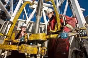 Crews work on CanElson’s Rig 1 in Alberta. CanElson canceled plans for several newbuilds in 2015 due to drops in global commodity prices. The contractor has had only one newbuild go to work in Canada this year, and several of its rigs have been coldstacked until the market improves. 