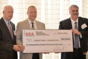 IADC’s Bob Warren (left) and Chevron’s Ben Bloys (right) presented the donation to Jeff Kessler, IADC Houston Chapter Chairman.