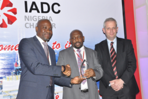 In June, the IADC Nigeria Chapter hosted a safety awards event to recognize superior industry performance. Winners included Idigo Drilling, Oando Energy Services, Depthwize Nigeria, Cardinal Drilling Nigeria, Shelf Drilling Nigeria and Pacific International Drilling West Africa. KCA Deutag Nigeria received the award for best HSE performance in 2014. Pictured from left are Sola Falodun, IADC Nigeria Chapter Chairman; Tokunbo Akinuli, Chapter Secretary, who accepted the award on behalf of KCA Deutag; and Markus Droll, Vice President Nigeria & Gabon, Shell Exploration and Production Africa. 