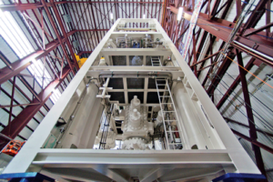 A 15k-psi subsea BOP stack is assembled in GE’s Houston BOP manufacturing high-bay facility.