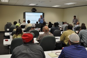 Randy Smith, Founder of Smith Mason & Co, facilitates a well control seminar for field operations staff with the Texas Railroad Commission on 25 May in Austin, Texas. 