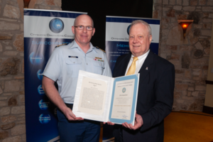 Captain Josh Reynolds (left) of the US Coast Guard presents IADC’s Alan Spackman (right) with a Meritorious Public Service Award at the Offshore Operators Committee 70th Anniversary General Meeting in Austin, Texas, on 6 June. The Coast Guard presented Mr Spackman with this award in recognition of the work he has done to improve safety, security and the environment on the US Outer Continental Shelf. 